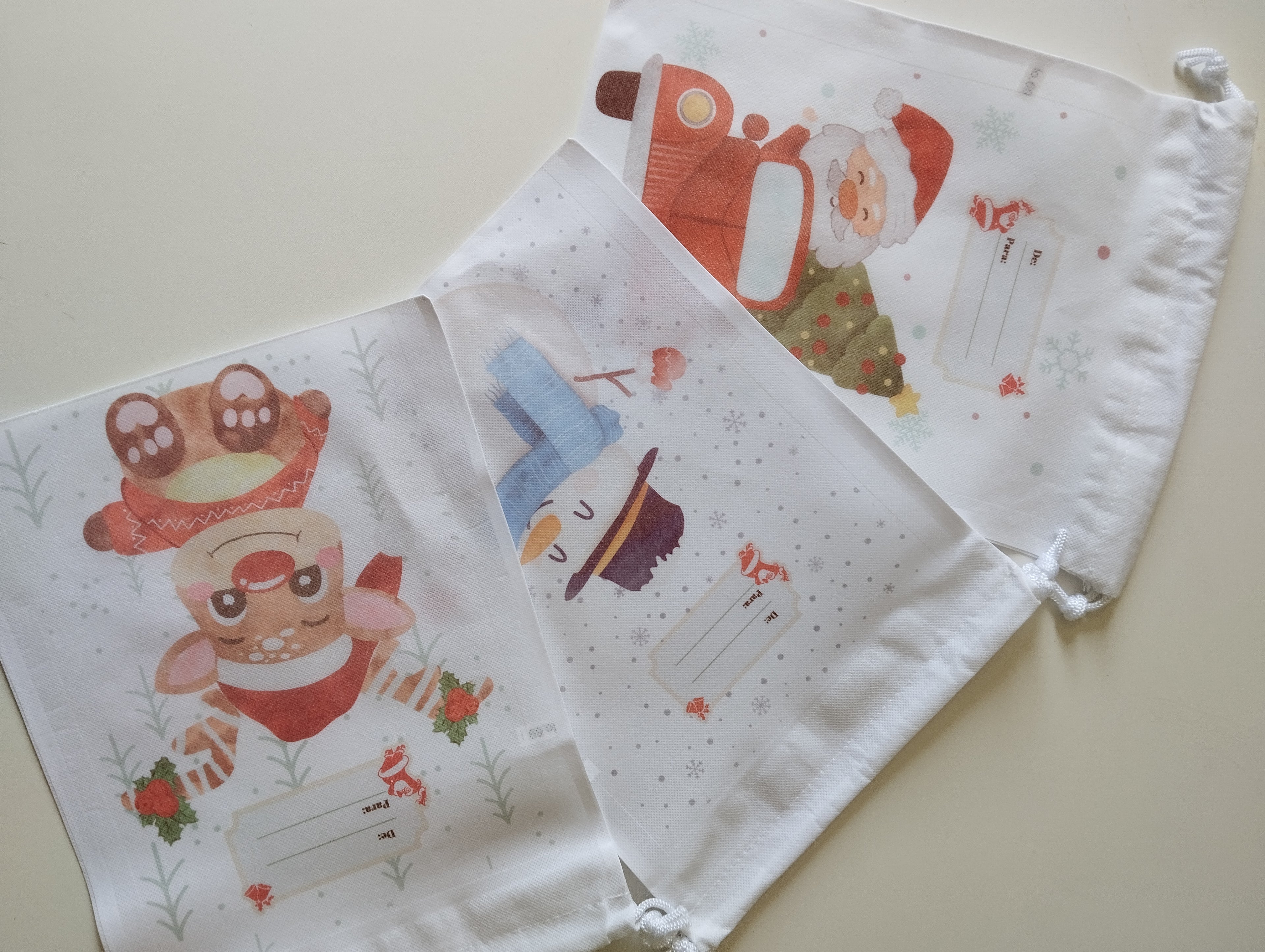 PACK 12 SACOS NAVIDEÑO DE TNT PARA ENVOLVER REGALO