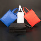 Bolsa TNT reutilizable «SAUL» con costuras termoselladas, asas 38 x 2.5 cm. 17